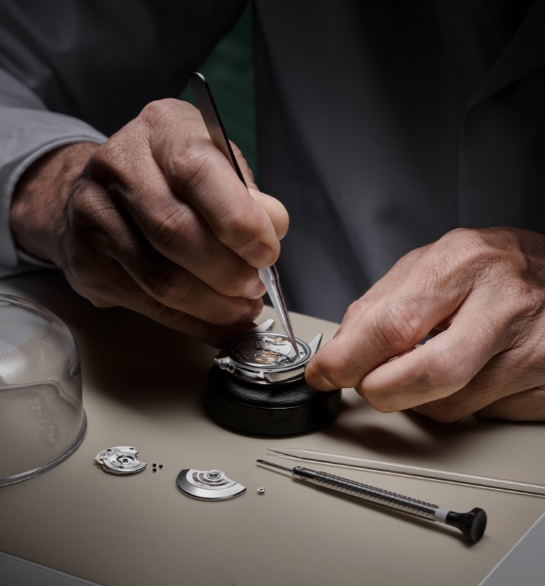 A Rolex watch being serviced